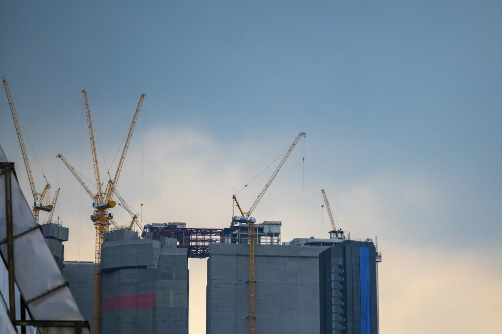 construction site building with crane, skyscraper building construction